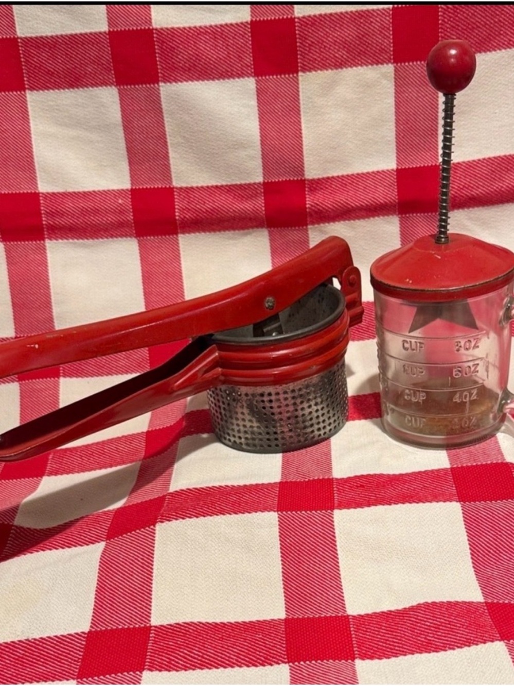 Hazel Atlas Measuring Cup and a Metal Potato Ricer/Fruit Press by Handy Things